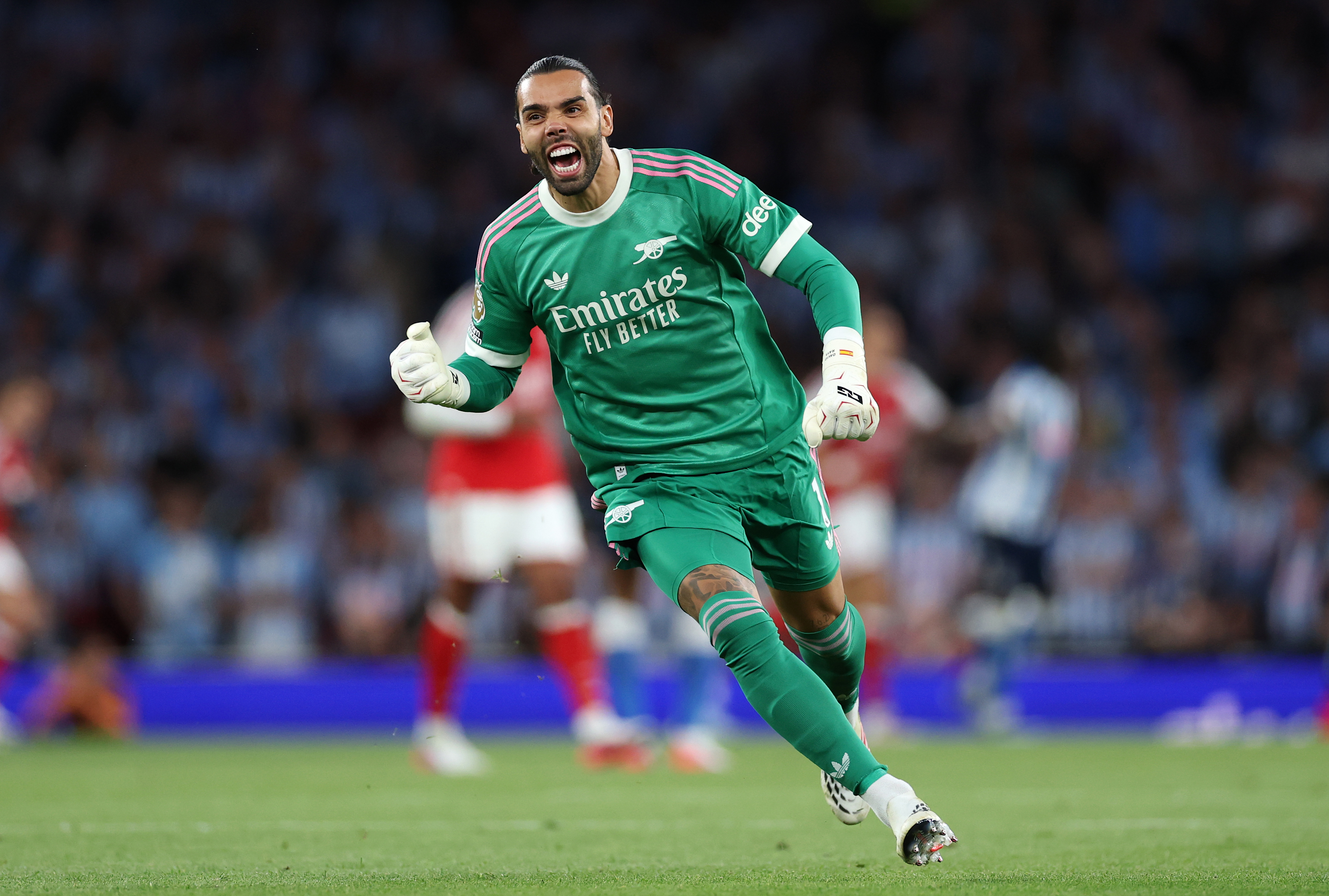 LONDON, ENGLAND - AUGUST 21: David Raya of Arsenal celebrates after team mate Bukayo Saka (not pictured) scores his team&amp;rsquo;s second goal during the Premier League 2026/27 match between Arsenal FC and Coventry City at Emirates Stadium on August 21, 2026 in London, England. (Photo by Justin Setterfield/Getty Images)