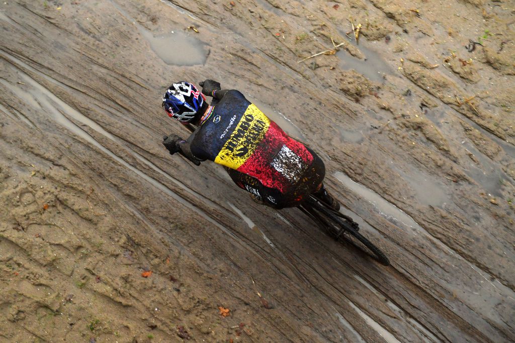 BOOM BELGIUM DECEMBER 04 Wout Van Aert of Belgium and Team Jumbo Visma competes on a muddy sector during the 7th Superprestige Cyclocross Boom 2021 Mens Elite SPBoom Superprestige2022 on December 04 2021 in Boom Belgium Photo by Luc ClaessenGetty Images