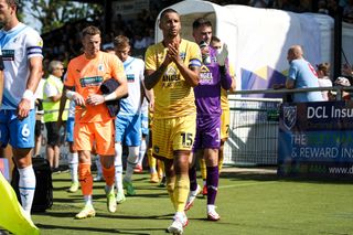 Craig Eastmond of Sutton United leads his side out during the Sky Bet League 2 match between Sutton United and Barrow at the Knights Community Stadium, Gander Green Lane,, Sutton on Saturday 13th August 2022. (Photo by Tom West/MI News/NurPhoto via Getty Images)