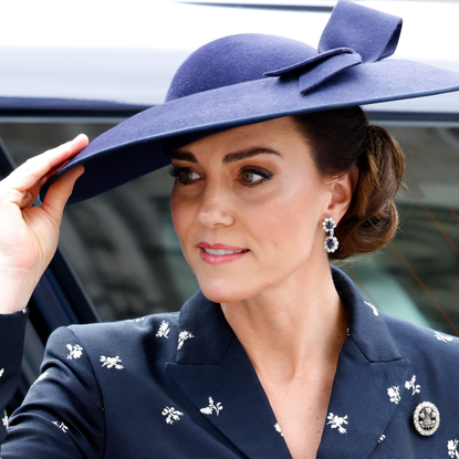 Catherine, Princess of Wales holds onto her hat in the wind as she attends the 2023 Commonwealth Day Service at Westminster Abbey on March 13, 2023 in London, England. The Commonwealth represents a global network of 56 countries, having been joined by Gabon and Togo in 2022, with a combined population of 2.5 billion people, of which over 60 percent are under 30 years old.