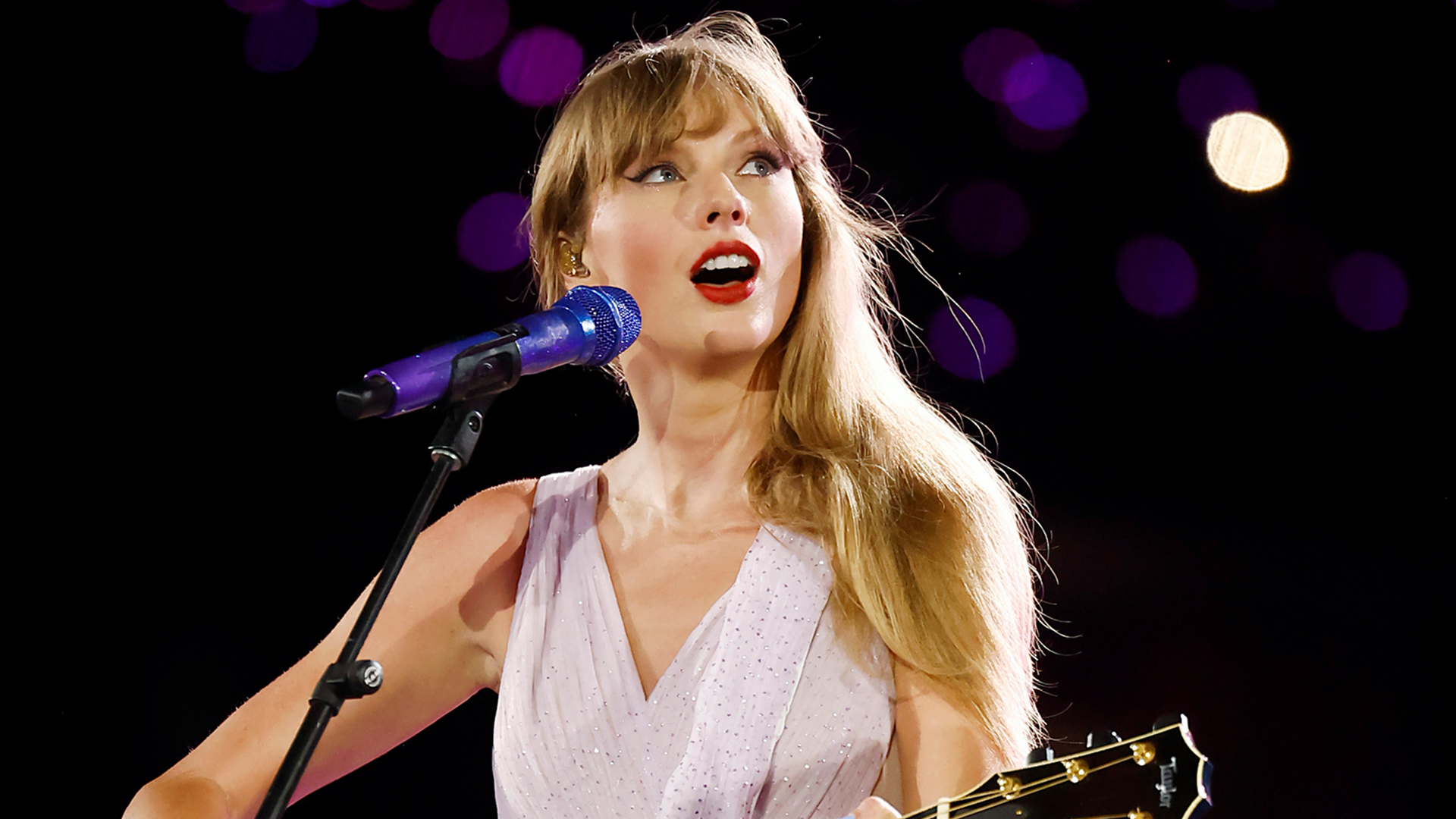 Taylor Swift styled a little lavender purple dress for her first public sighting since her wedding
