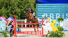Chris Burton and Shadow Man on their way to winning individual bronze at the Paris Olympics