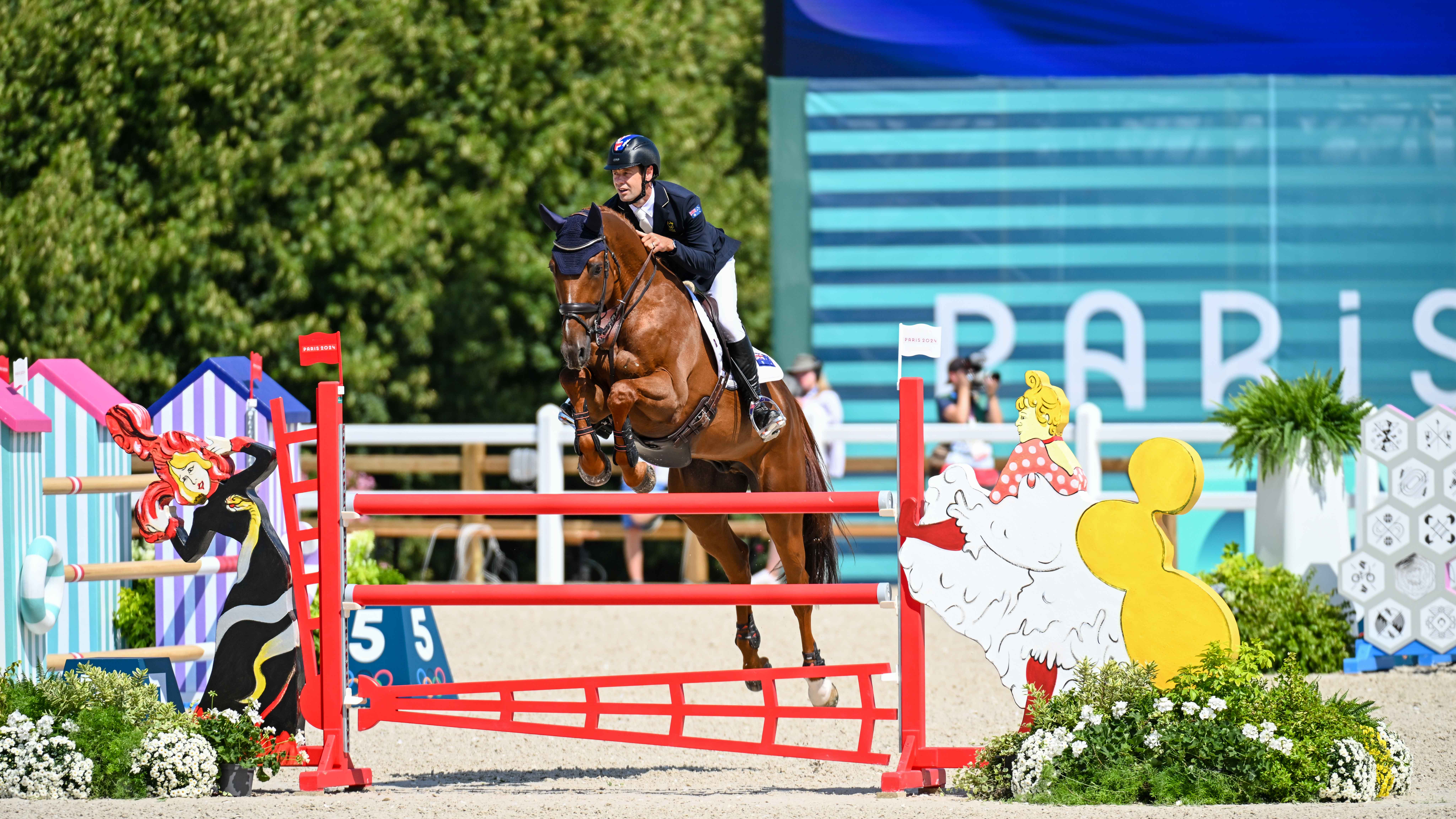 Chris Burton and Shadow Man on their way to winning individual bronze at the Paris Olympics
