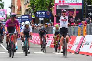 UAE Team Emiratess German rider Pascal Ackermann R celebrates after he crossed the finish line to win ahead of Bahrain Victoriouss Italian rider Jonathan Milan L and Astana Qazaqstan Teams British rider Mark Cavendish 2ndL the eleventh stage of the Giro dItalia 2023 cycling race 219 km between Camaiore and Tortona on May 17 2023 Photo by Luca Bettini AFP Photo by LUCA BETTINIAFP via Getty Images