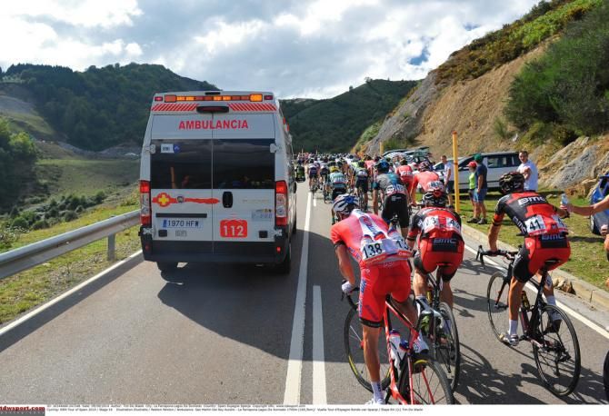 The race ambulance at the back of the bunch