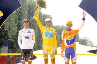 Andy Schleck (Saxo Bank), Alberto Contador (Astana) and Denis Menchov (Rabobank) on the podium in Paris