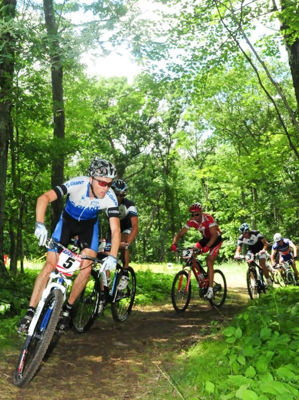 Carl Decker (Giant) leading the race in a short section of singletrack.