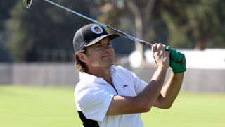 Jason Bateman takes a shot in the pro-am before the 2022 Genesis Invitational