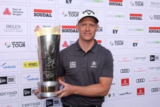 Simon Forsstrom celebrates with the Soudal Open trophy