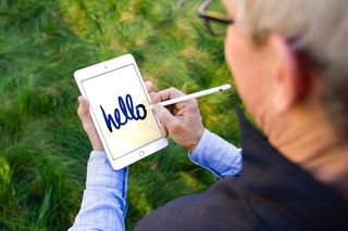 Tim Cook with iPad Mini 5 and Apple Pencil