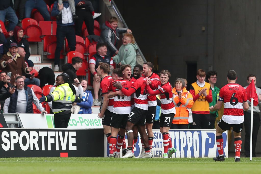 Harrison Biggins of Doncaster Rovers is celebrating after scoring their third goal during the Sky Bet League 2 match between Doncaster Rovers and Barrow at the Keepmoat Stadium in Doncaster, on April 20, 2024.