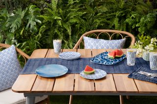 a table set up with outdoor dining products