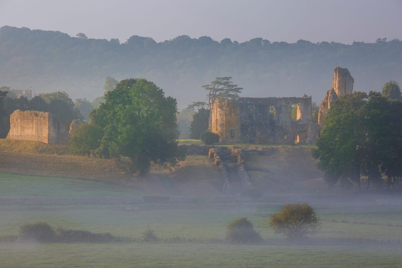 Misty dawn over Sherborne Castle, once Sir Walter Raleigh&#039;s home.