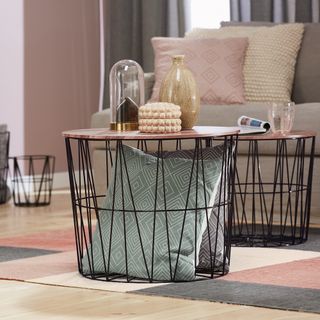 living room with wire table and baskets