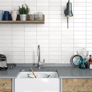 White ceramic subway tiles on kitchen backsplash