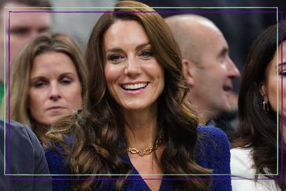 Kate Middleton smiles and wears a blue blazer as she attends the NBA basketball game between the Boston Celtics and the Miami Heat at TD Garden on November 30, 2022 in Boston, Massachusetts.