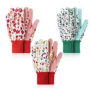 Three pairs of gardening gloves. Top left are white with red and pink flowers and a red wristband. Top right are white with green flowers and a green wristband. Bottom middle are white with multi-coloured flowers and a red wristband