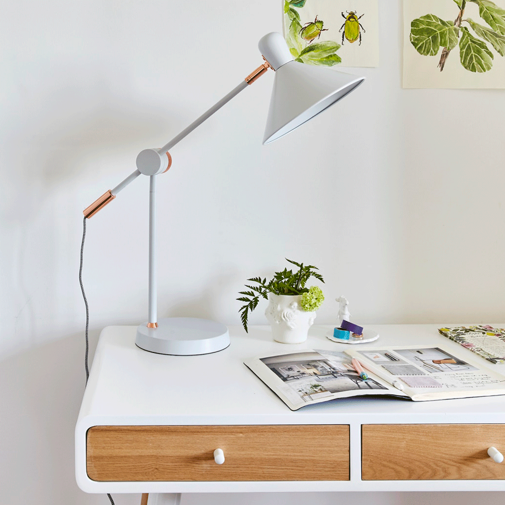 office room with table and lamp