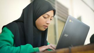 Student studying on a Chromebook