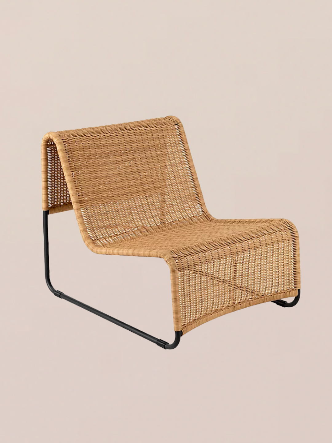 A rattan garden armchair on a structural frame