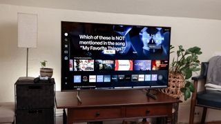 A Samsung DU7200 LED TV on a side table