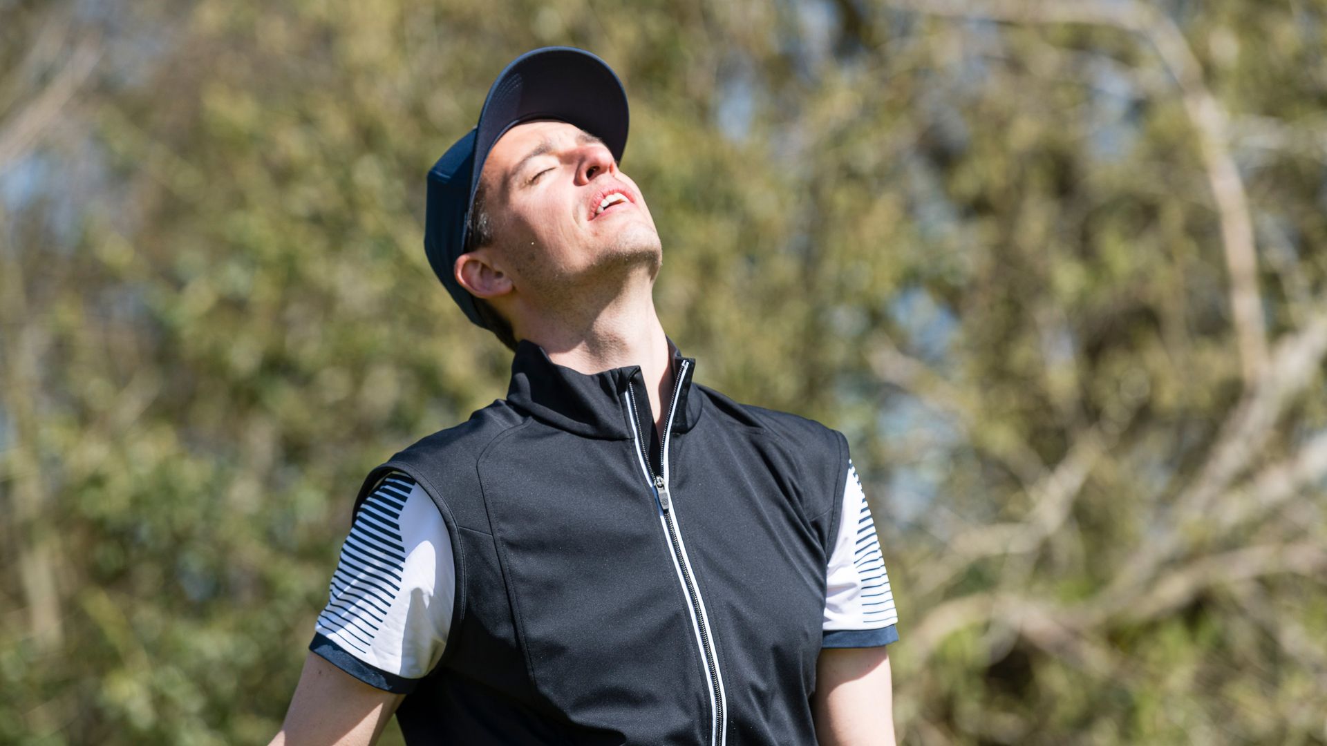 A disgruntled golfer after hitting a bad shot at Essendon GC