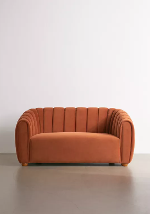 Tufted love seat sofa.
