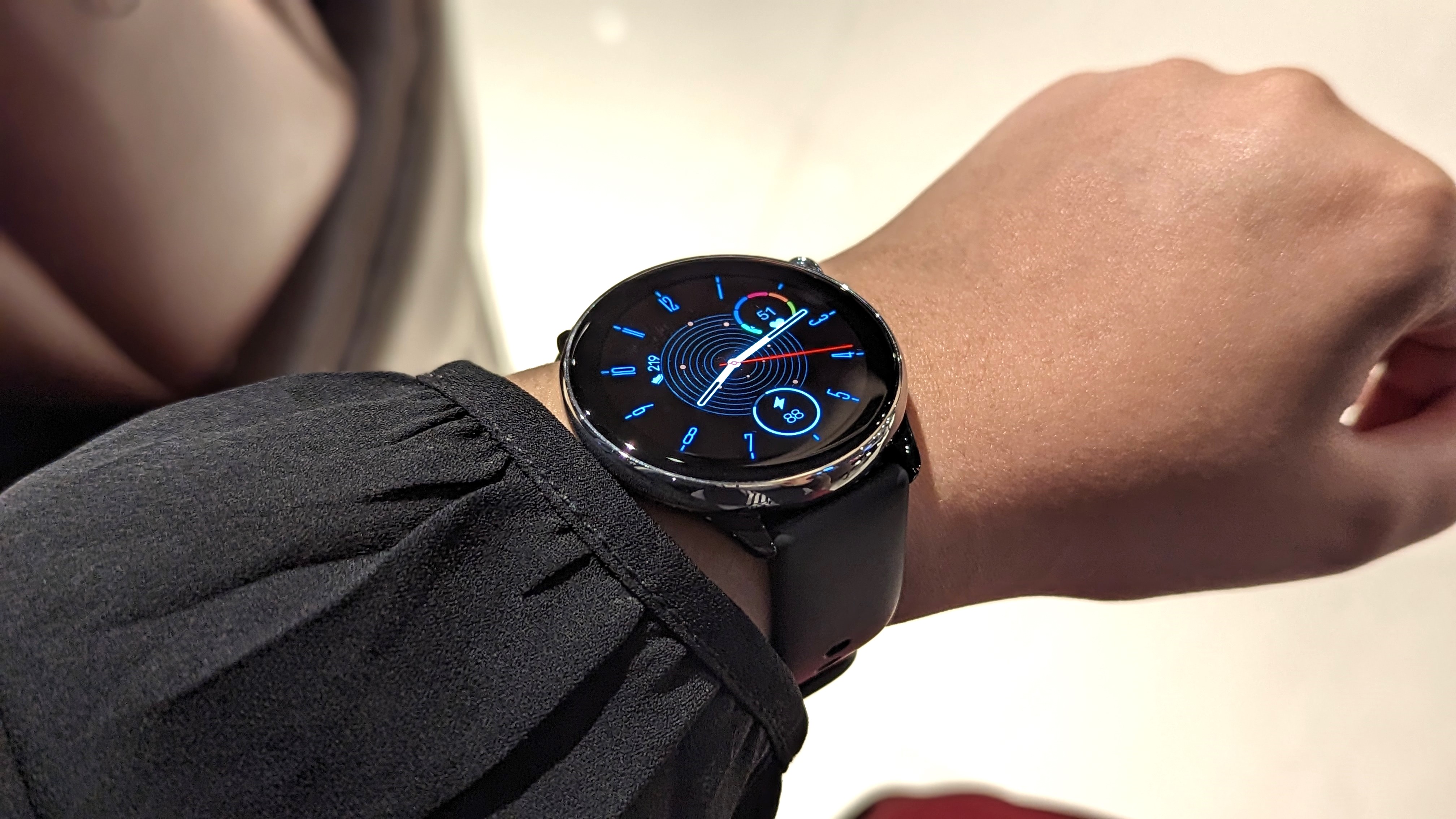 Amazfit GTR Mini smartwatch worn on a wrist, showcasing the basic watch face.