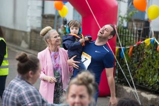 Mick finishes the race in EastEnders