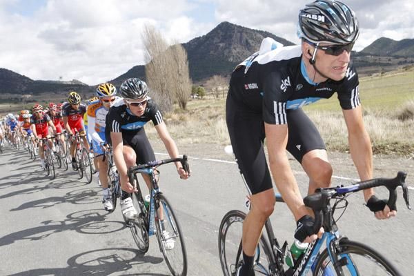 Bradley Wiggins (Sky) sets tempo in the field.
