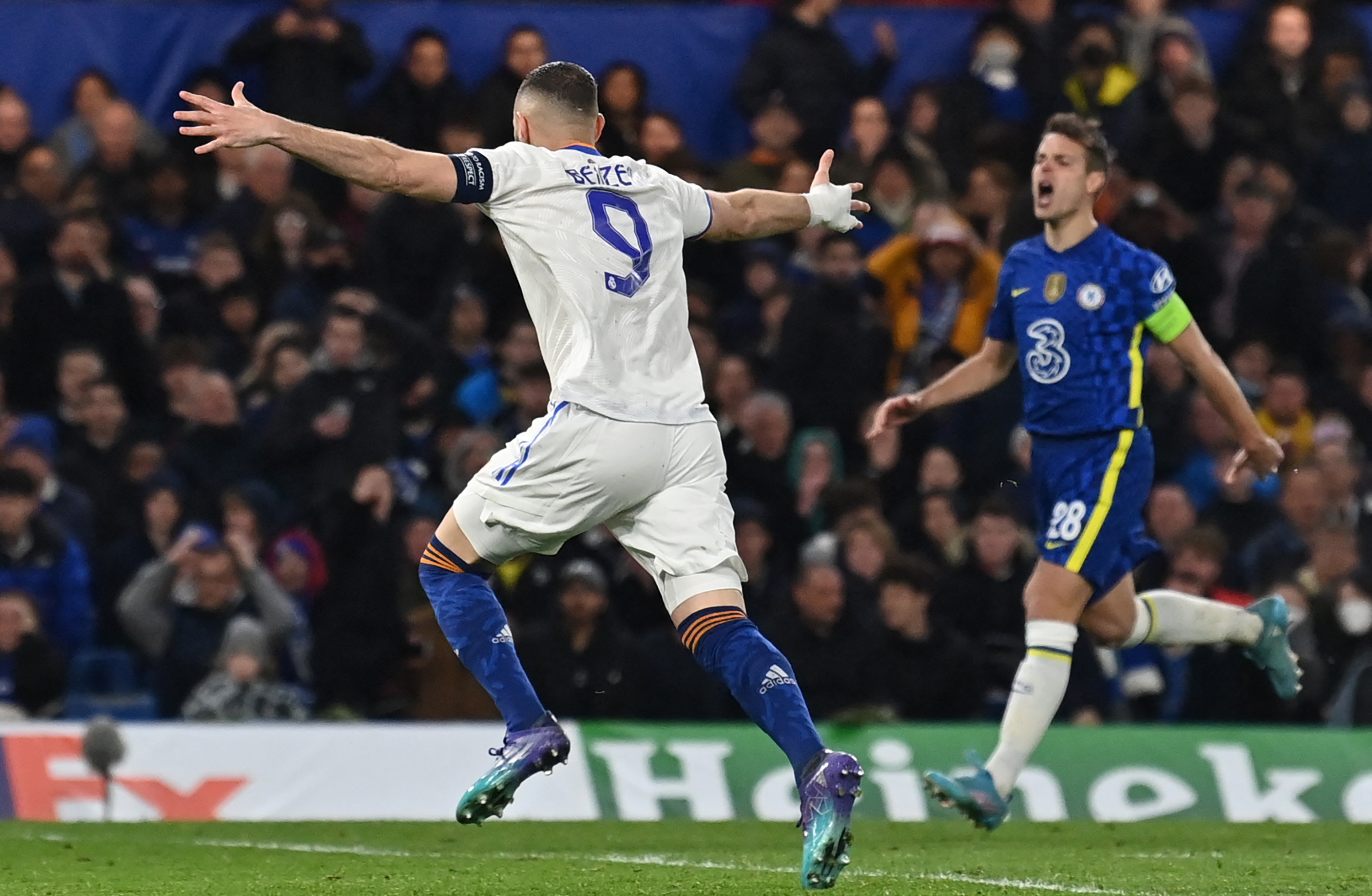 Karim Benzema celebrates his third goal for Real Madrid against Chelsea in the Champions League in April 2022.