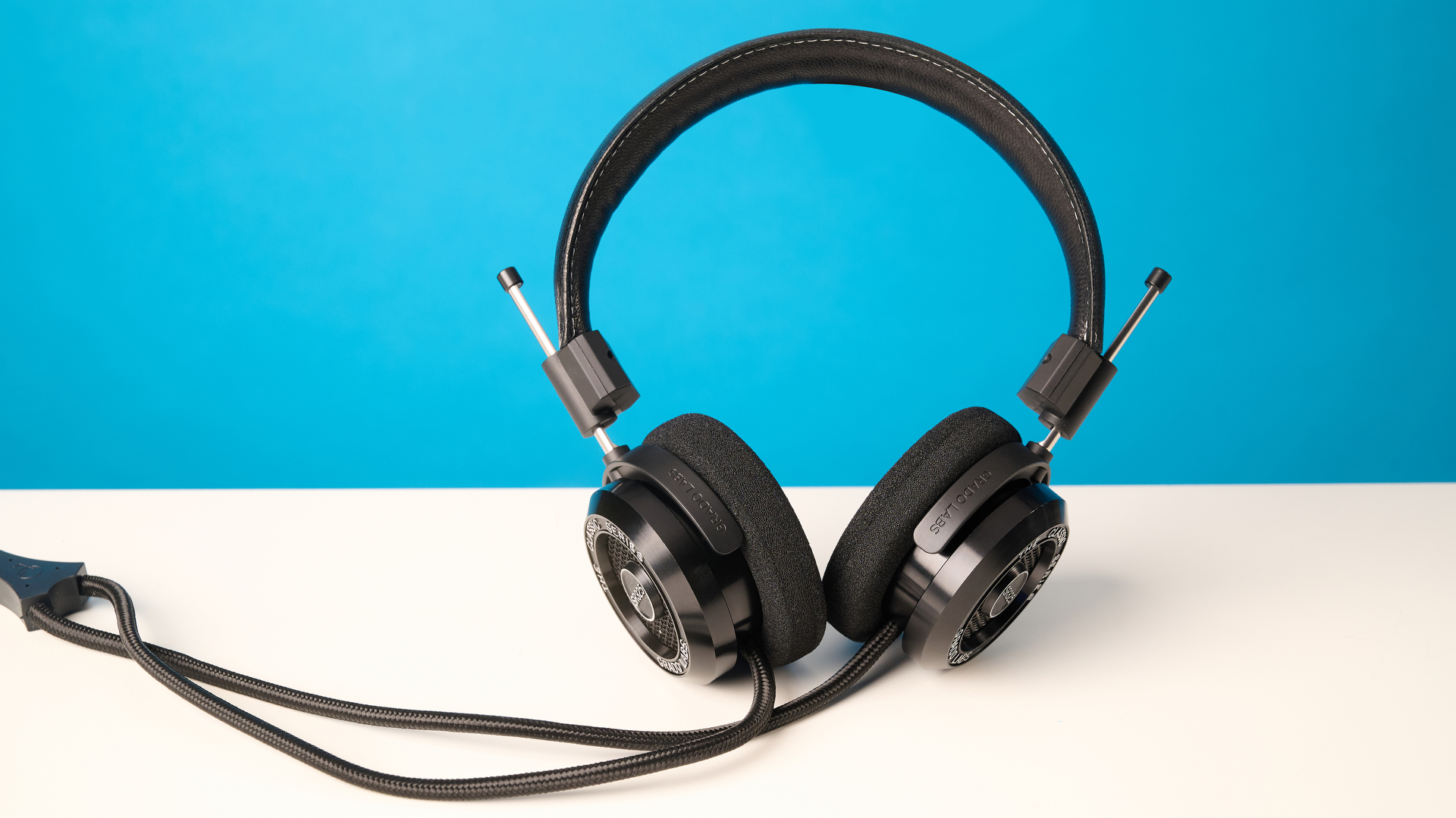 Grado SR325 photographed in front of a blue background