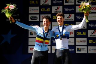 TRENTINO ITALY SEPTEMBER 08 LR Silver medalist Cian Uijtdebroeks of Belgium and gold medalist Alec Segaert of Belgium pose on the podium during the medal ceremony after the 27th UEC Road Cycling European Championships 2021 Junior Womens Individual Time Trial a 224km in Trentino UECcycling on September 08 2021 in Trentino Italy Photo by Justin SetterfieldGetty Images