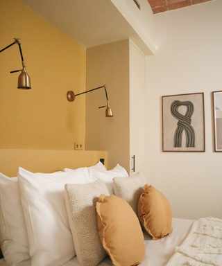 Yellow bedroom and bedding with integrated bespoke shelving unit