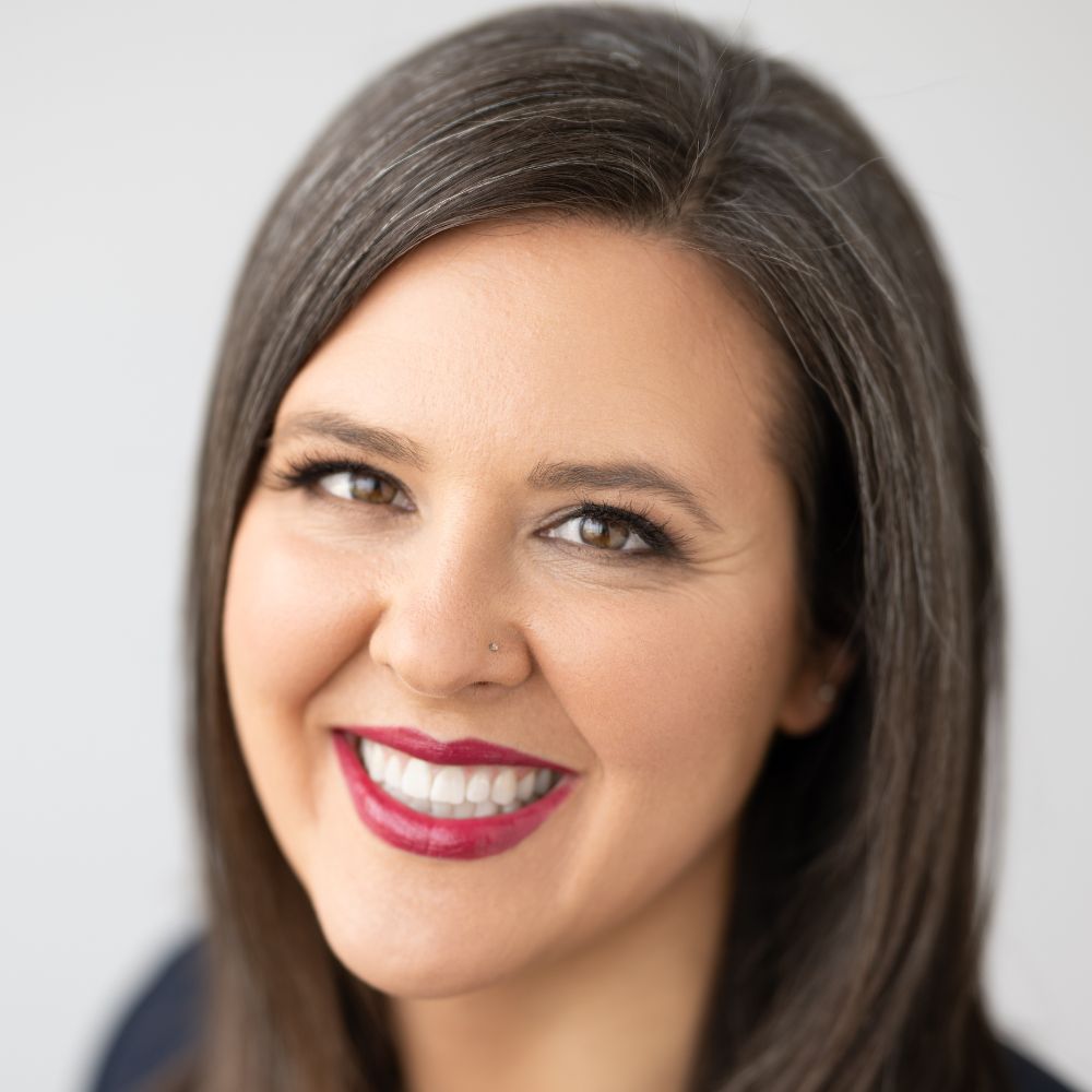 A headshot of Devon Fegen-Herdman