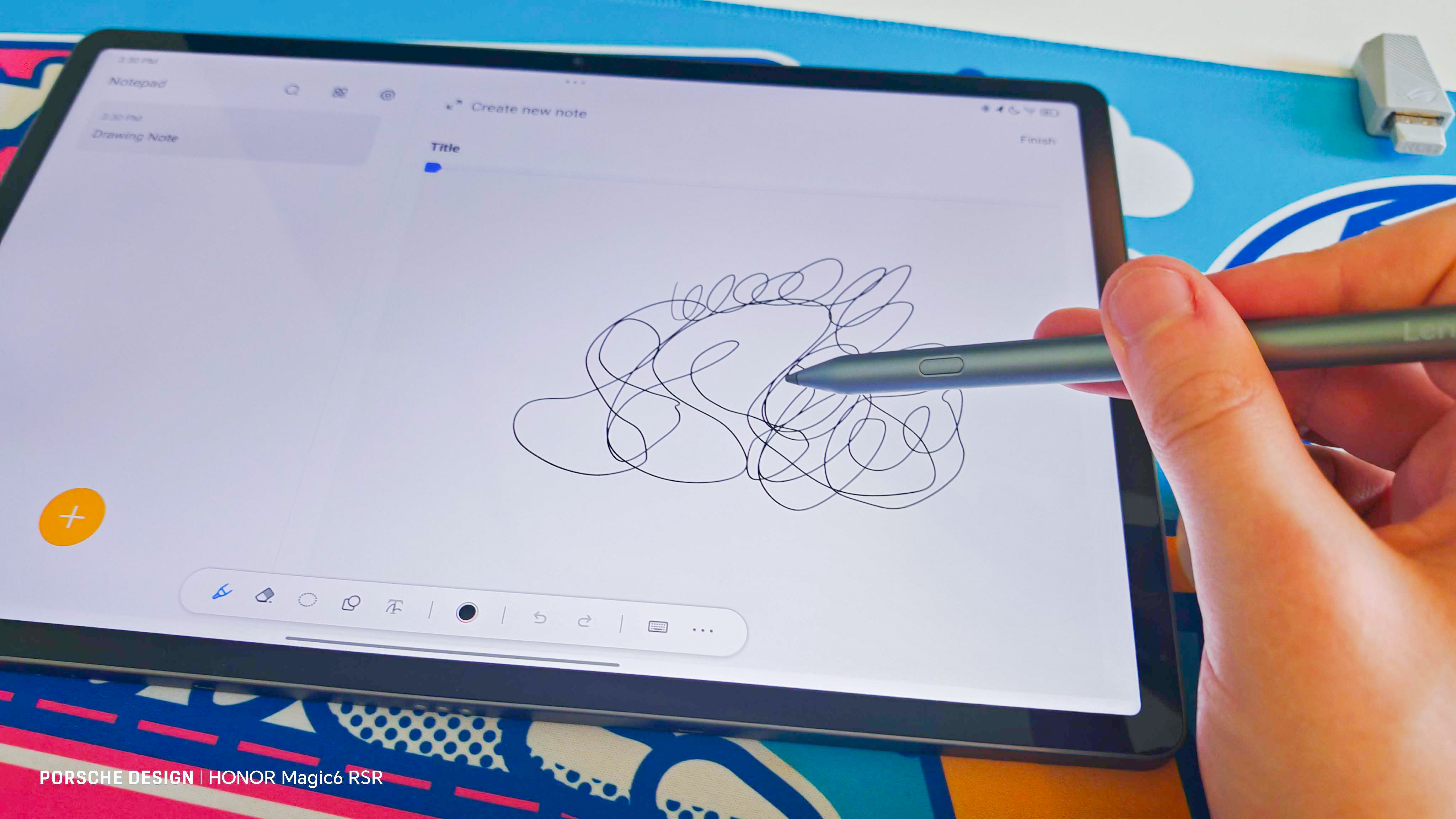Lenovo Idea Tab Pro tablet with stylus showing front screen and back with cameras