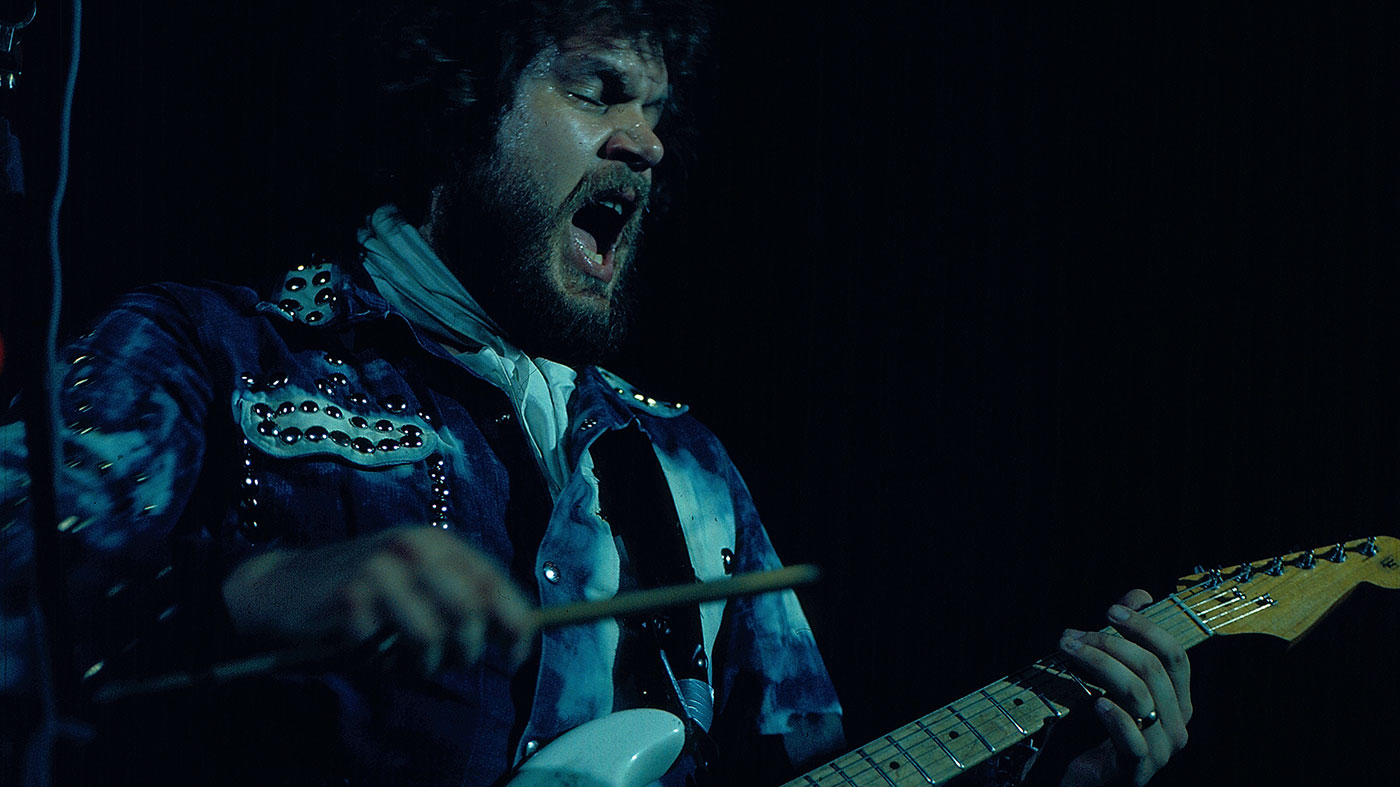 Performing on stage, Hammersmith Odeon, London, 1975