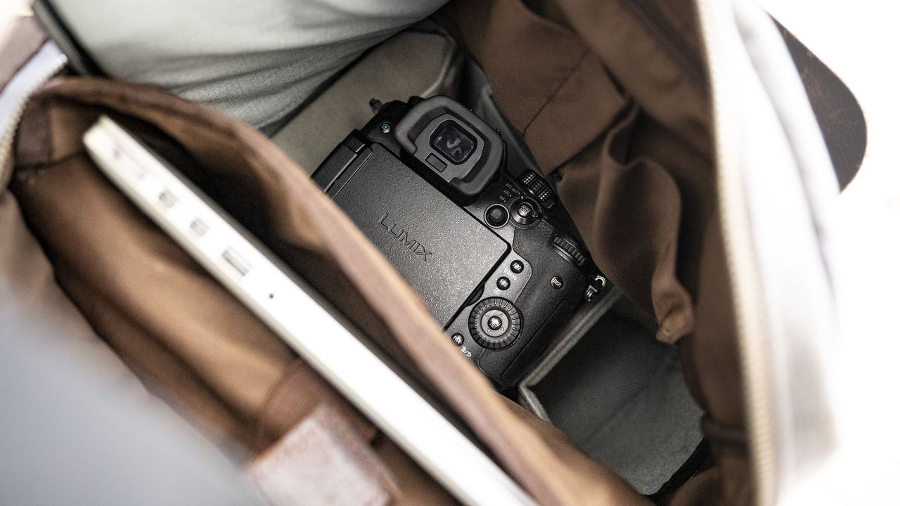 Peak Design Camera Cubes inside a regular bag on wooden table outside