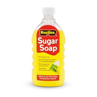 Yellow sugar soap 500ml on white background