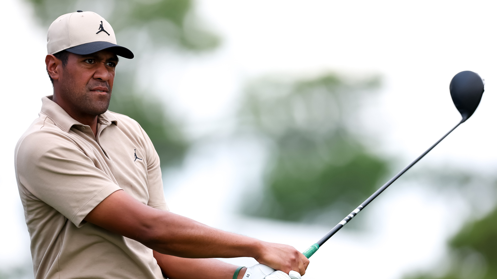 Tony Finau hits a driver off the tee