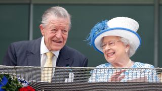 The Queen faces double heartache, Sir Michael Oswald (National Hunt Racing Adviser to Queen Elizabeth II) and Queen Elizabeth II watch the racing from the balcony of the Royal Box as they attend Derby Day during the Investec Derby Festival at Epsom Racecourse on June 4, 2016 in Epsom, England.