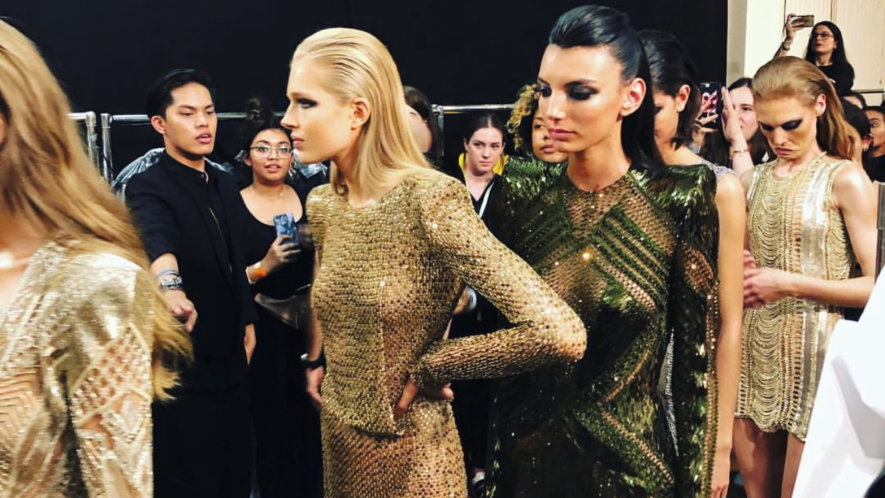 Models backstage at London Fashion Week
