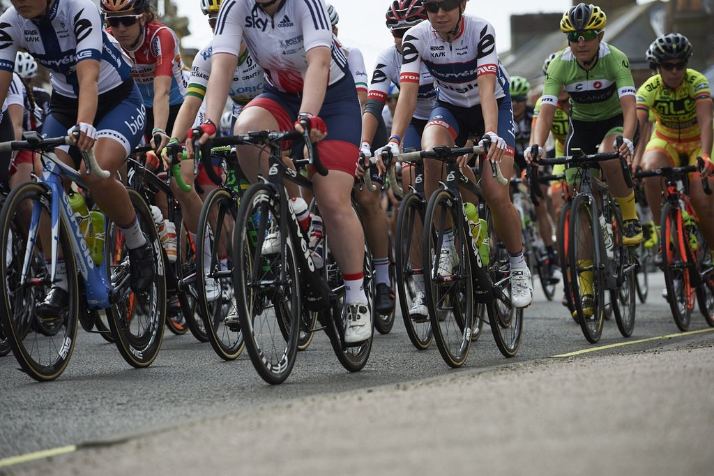 Tightly bunched as the riders leave Southwold