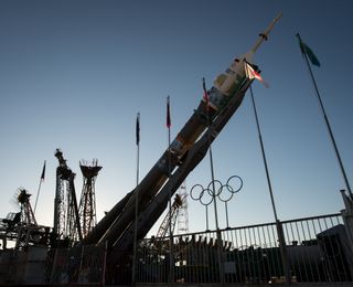 Soyuz Rocket Erected Next to Olympic Rings