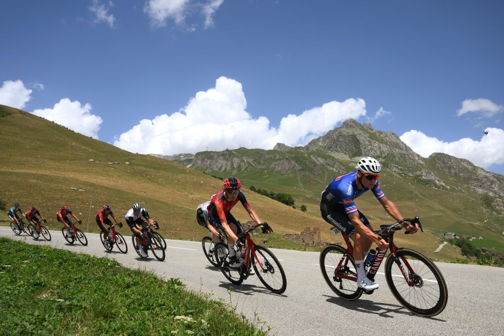 COURCHEVEL FRANCE JULY 19 LR Carlos Rodriguez Cano of Spain and Team INEOS Grenadiers and Mathieu Van Der Poel of The Netherlands and Team AlpecinDeceuninck compete climbing down the Cormet de Roselend 1971m during the stage seventeen of the 110th Tour de France 2023 a 1657km at stage from SaintGervais MontBlanc to Courchevel UCIWT on July 19 2023 in Courchevel France Photo by David RamosGetty Images