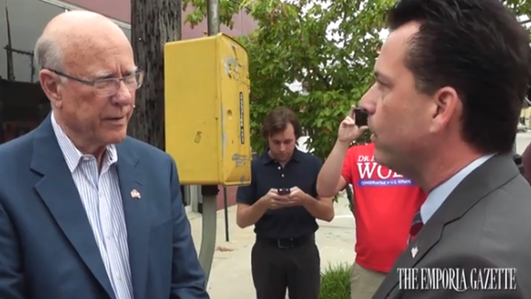 Sen. Pat Roberts&amp;#039; Republican primary challenger confronts him during campaign stop, challenges him to debate