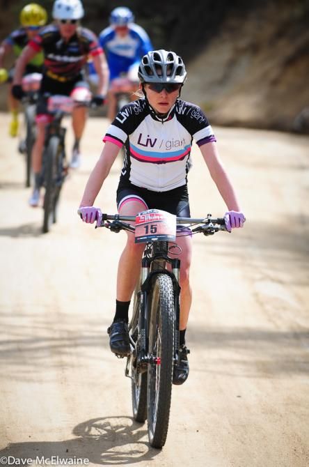 Erin Alders (Liv Giant) sitting up after the long climb up the mountain