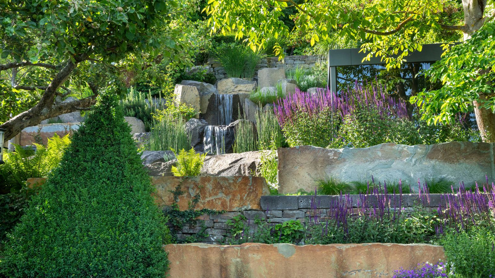 Clever terracing tricks turned this steep sloped garden into the