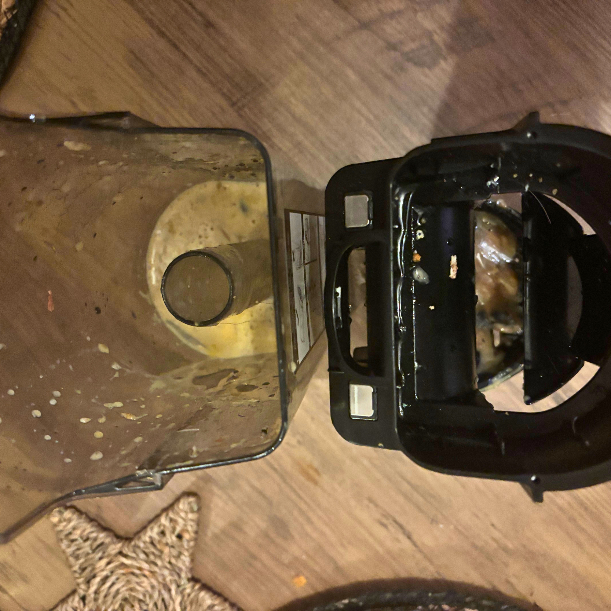 Ariel view of the contents of the Shark HydroVac Cordless Hard Floor Cleaner dirty water tank