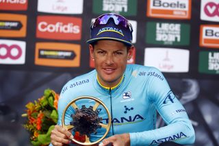 Jakob Fuglsang with his first-placed trophy
